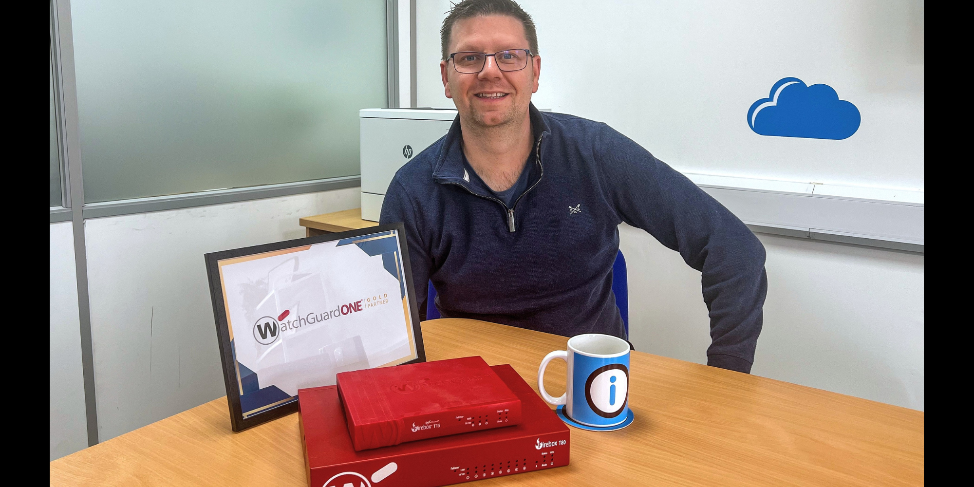 Peter White, Director at Information Solutions celebrates gaining cyber security expertise recognition as Watchguard Gold Partner