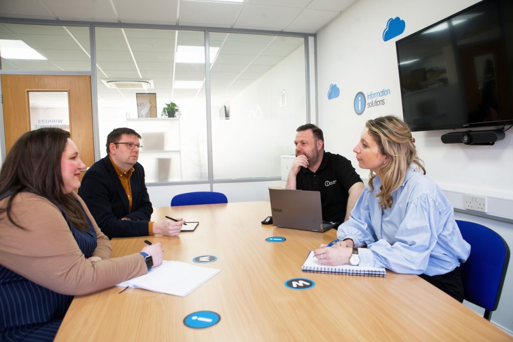 The Information Solutions team meeting with a client in the Shrewsbury office